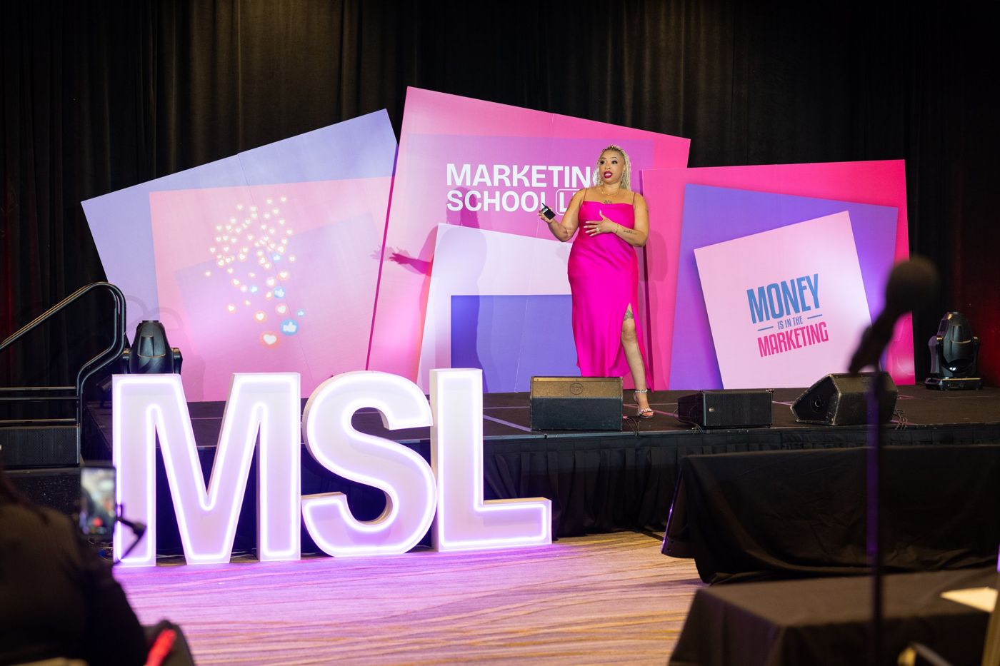 Aprille teaching on the Marketing School LIVE stage