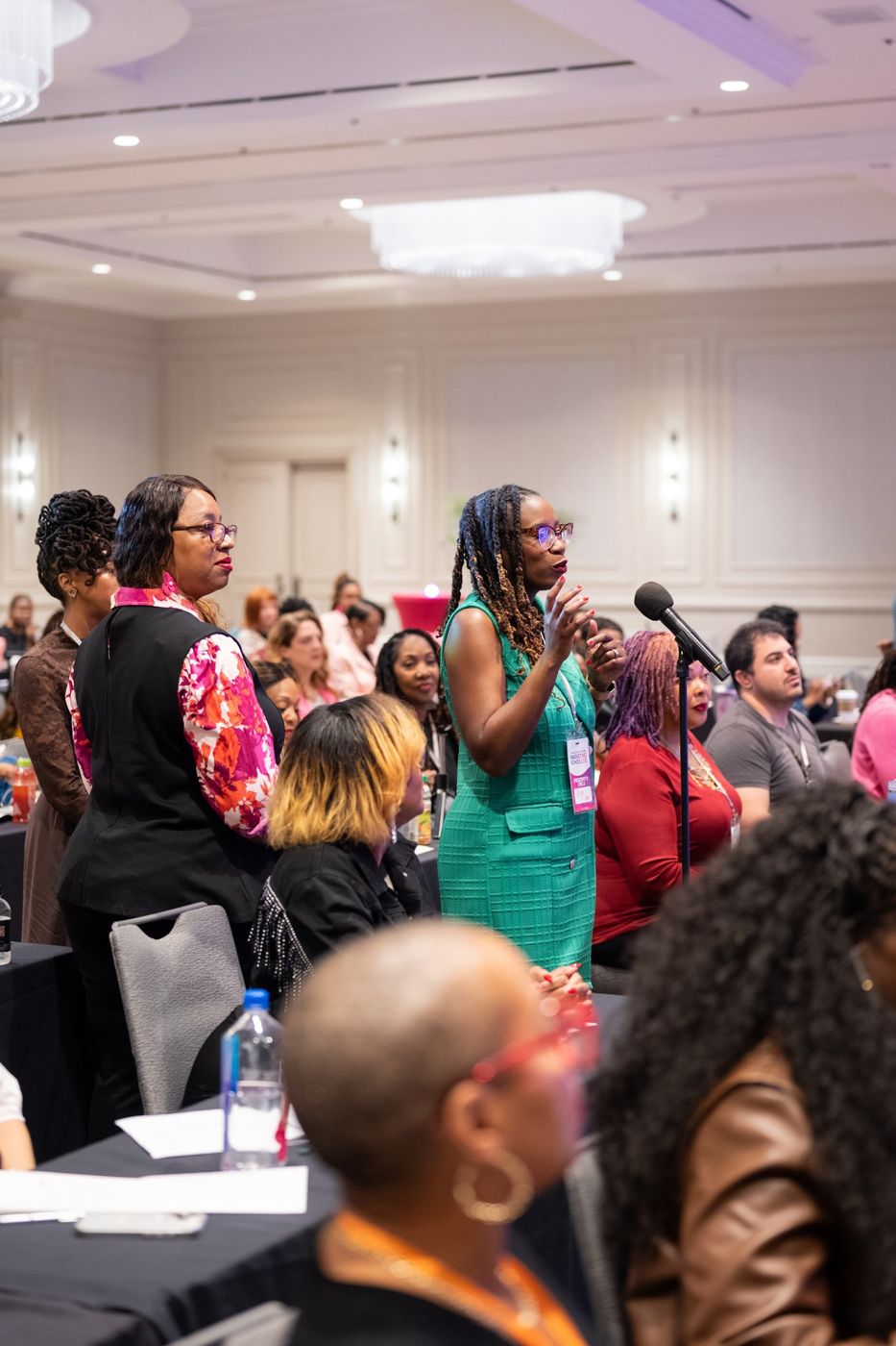 An attendee at the mic asking a question