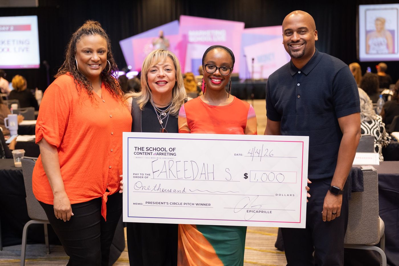 President's Circle pitch winner with her check